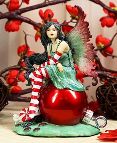 Ebros Amy Brown Santa, Elf Fae Fae Peppermint Candy Cane Fairy חג המולד יושב על קישוטים אדומים אספן צלמיות